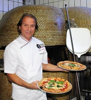 Pizzamaker Gennaro Luciano at his family’s pizzeria, Port’Alba