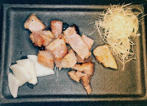 Grilled-Berkshire-Pork-in-Koji-with-shaved-leek-and-pickled-daikon-radish-1